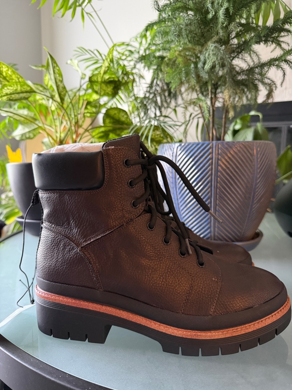 Maurices women’s brown and black lace up boots.